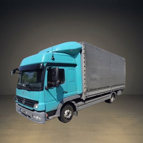 Turquoise Mercedes delivery truck with white cargo box photographed against a neutral gray background