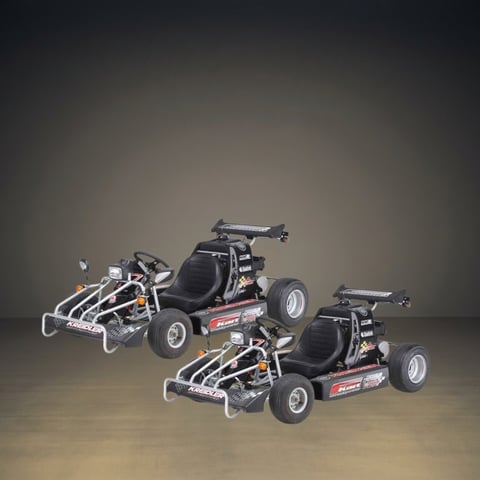 Three miniature go-kart toy models displayed against a neutral gray background