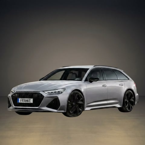 Silver Audi RS6 Avant wagon with black alloy wheels on neutral background