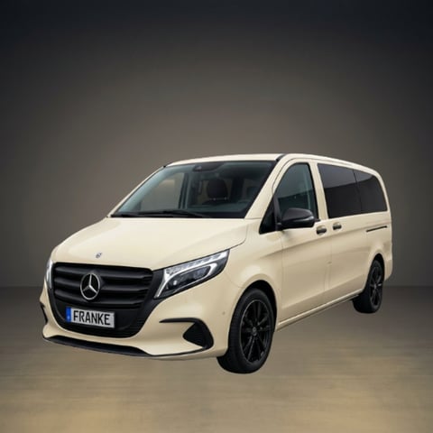 White Mercedes-Benz minivan with custom license plate, displayed against a dark gradient background